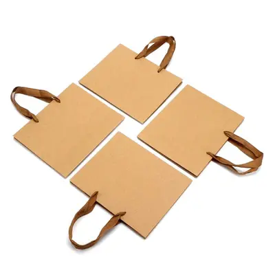 Pungi kraft dreptunghiulare cu mâner textil (set 12 buc) - 27x21x9cm